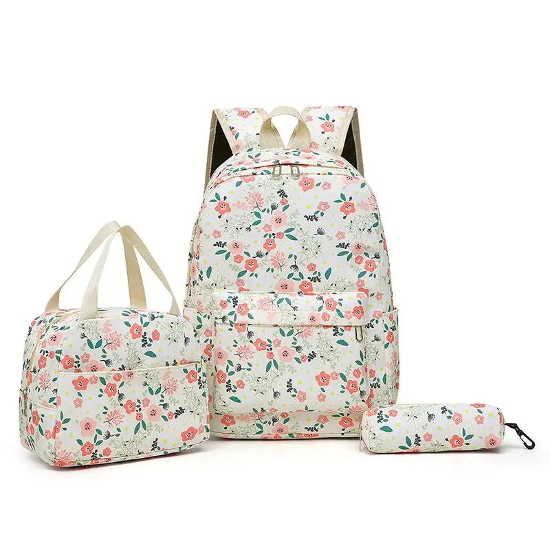 A floral patterned backpack set including a backpack, a handbag, and a pencil case.