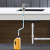Stainless steel under-sink soap dispenser with an extension tube connected to a kitchen sink.