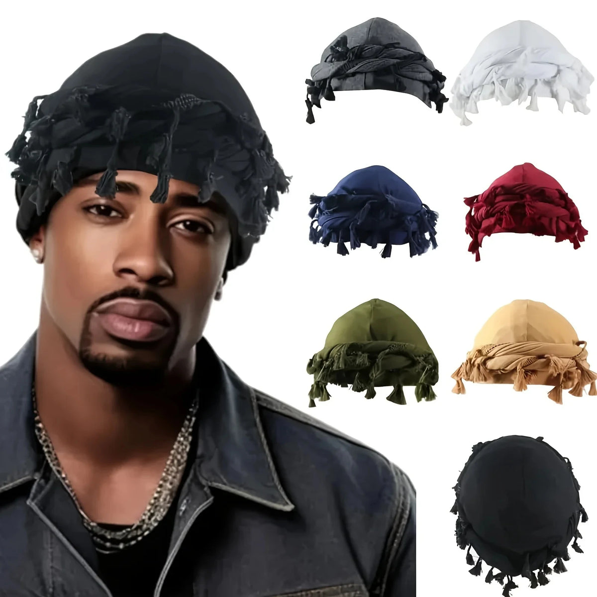 A man models a black vintage twist head wrap with tassels and various colored fabric wraps.