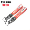 A single red and black JDM-style eagle beak clasp keychain with a sliding mechanism.