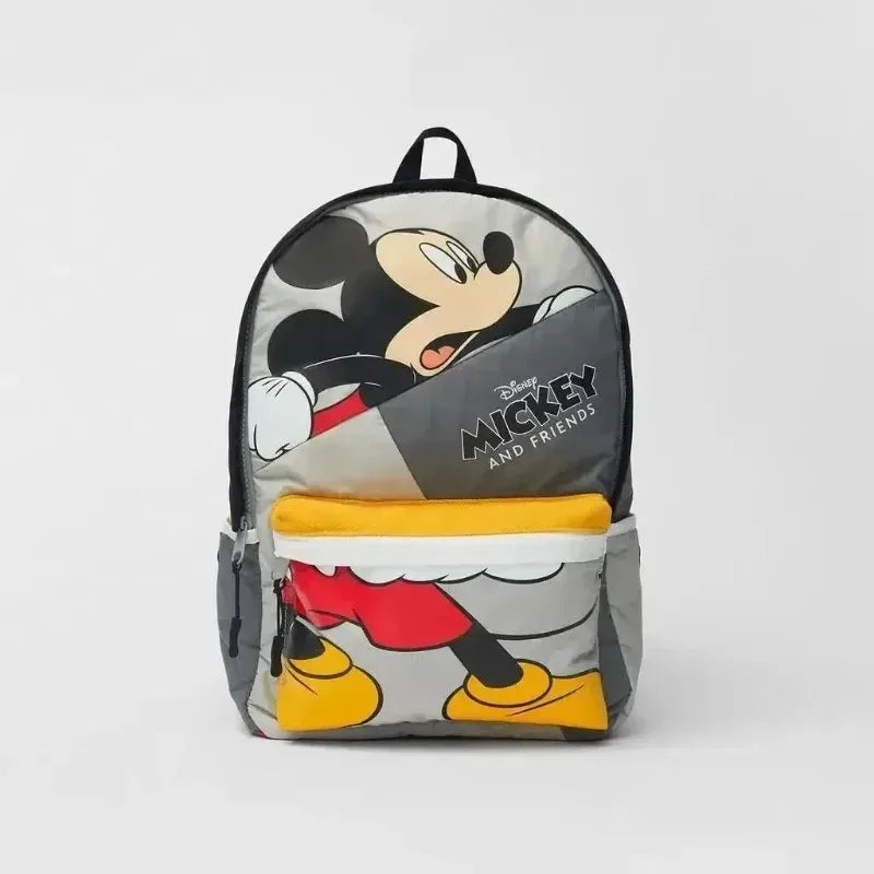 A gray backpack featuring a Disney Mickey and Friends design with yellow accents.
