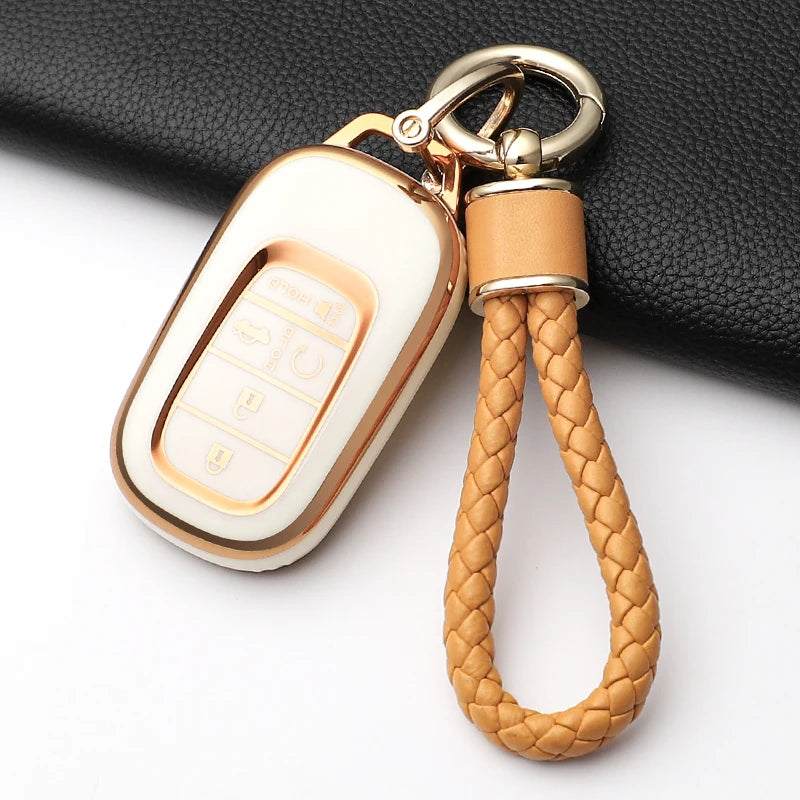 A beige anti-scratch TPU protective case for a Honda key fob attached to a leather strap.