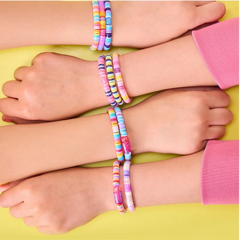 Hands wearing colorful friendship bracelets and pink wristbands on a yellow background.