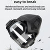 A close-up view of a black anti-fog motorcycle goggle with a clear lens, demonstrating impact resistance.