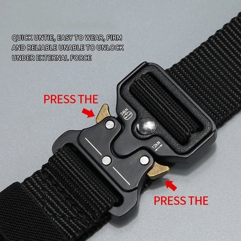 Close-up of a black tactical nylon belt and buckle showing instructions for pressing the mechanism.