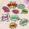 A collection of colorful embroidered lettering patches featuring words like BANG HOW WTF OK ZAP OHH OMG POW
