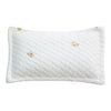 White quilted baby pillow with small bear embroidery