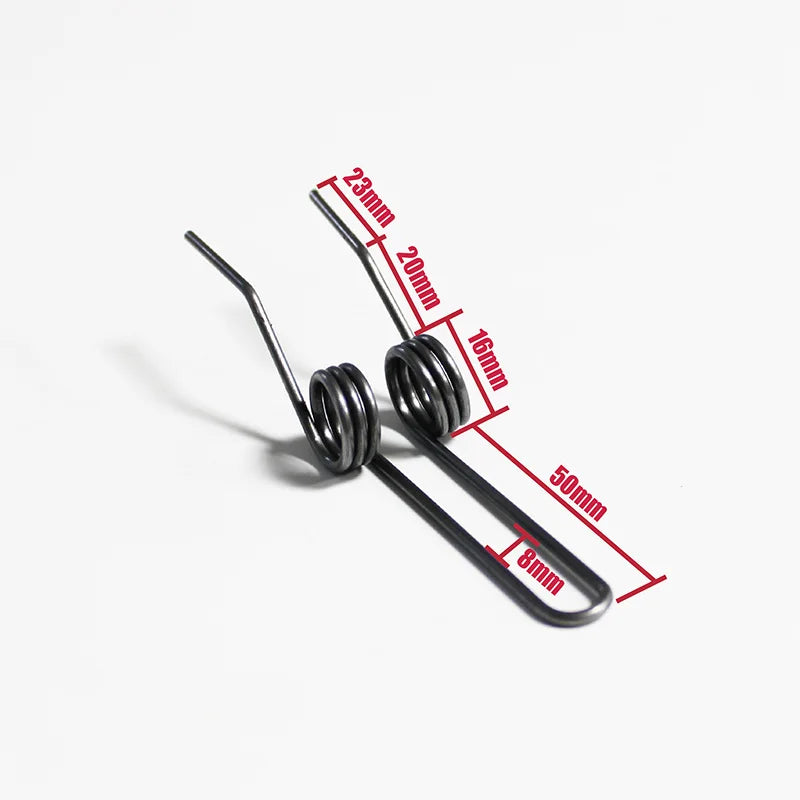 A set of black double torsion springs with varying lengths and diameters shown against a white background.