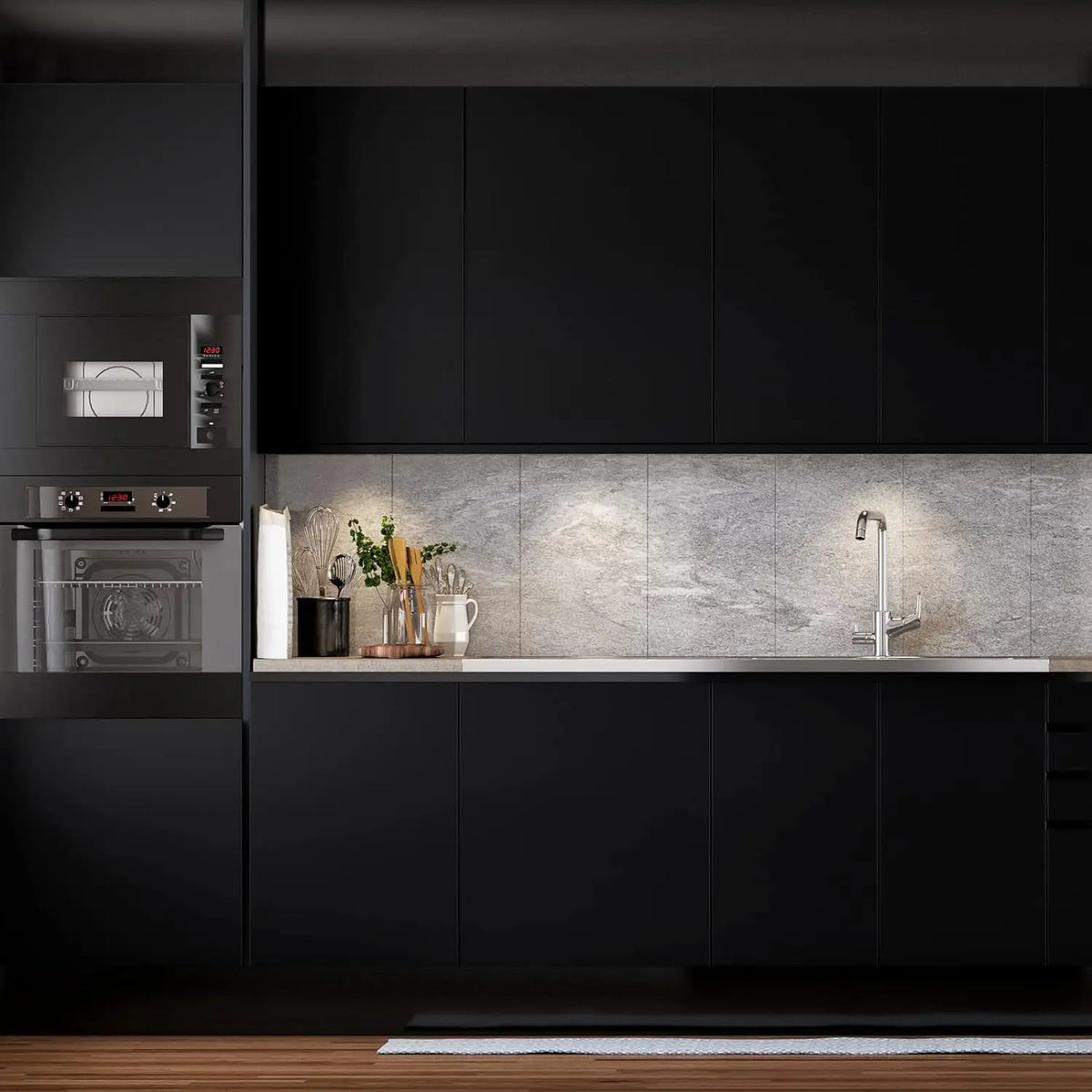 Matte black self-adhesive vinyl wallpaper applied to kitchen cabinets and countertops.