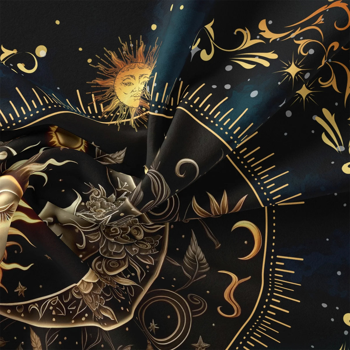 Dark fabric featuring a celestial design with a sun, moon, and golden decorative elements.