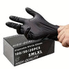 A hand wearing a black disposable nitrile glove is holding a box of high-quality gloves.