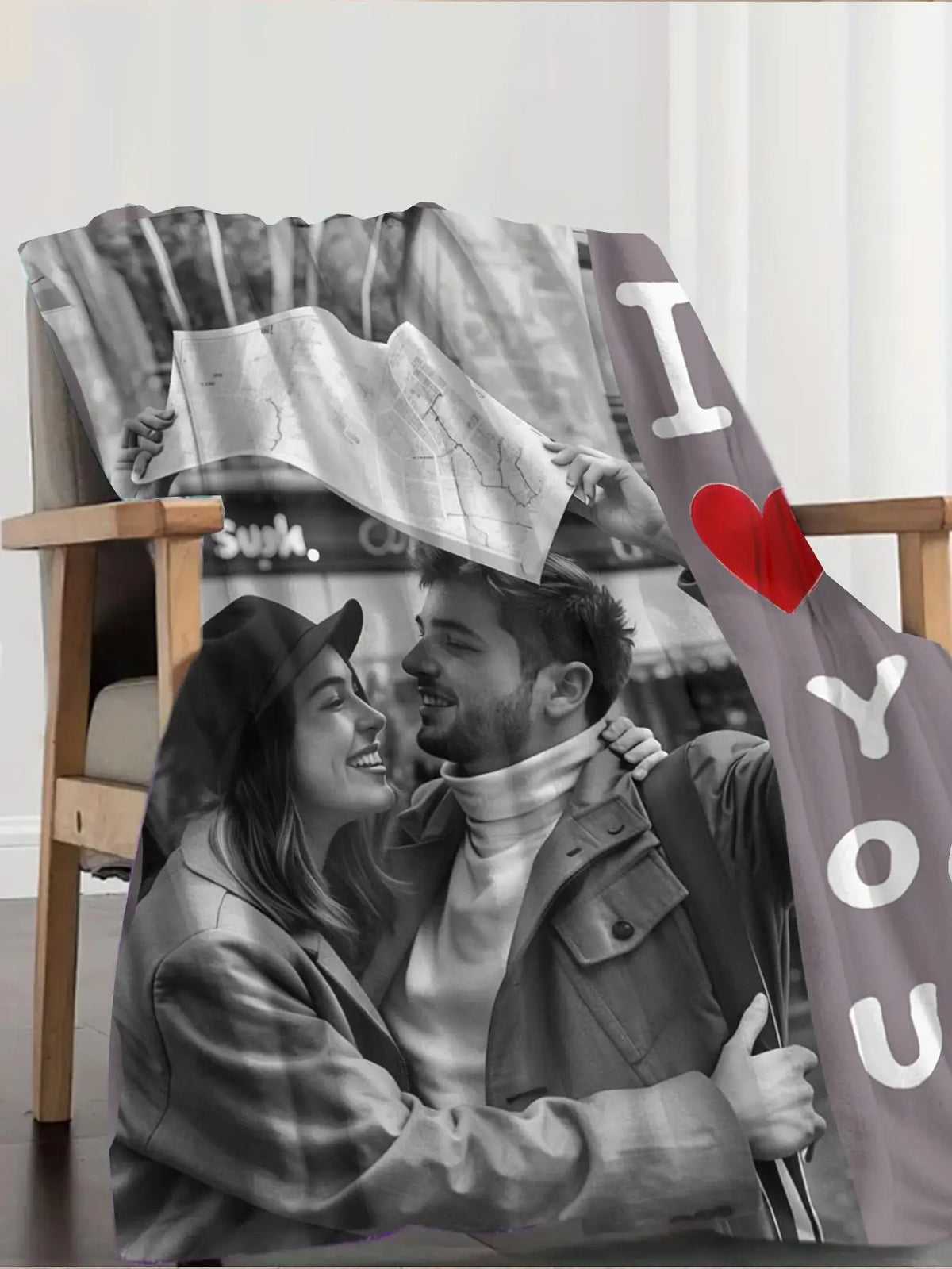 A couple smiling while holding a map, featured on a custom photo flannel blanket.