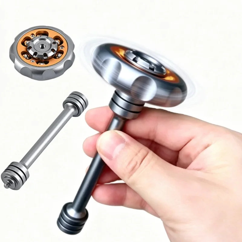 A hand holds a metal fidget spinner with a cylindrical shaft and a decorative top, showing the device's construction.