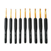 A set of ergonomic crochet hooks with soft grip handles in various sizes and colors.