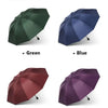 Four colors of extra-large windproof folding umbrellas: green, blue, red, and purple.