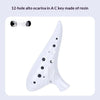 A white resin alto ocarina in the shape of a bird, featuring 12 holes.