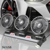 A silver car cooling fan with dual heads and an aromatherapy diffuser mounted on a portable base.