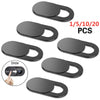 A set of ten black privacy webcam covers or sliders for laptops and mobile devices.