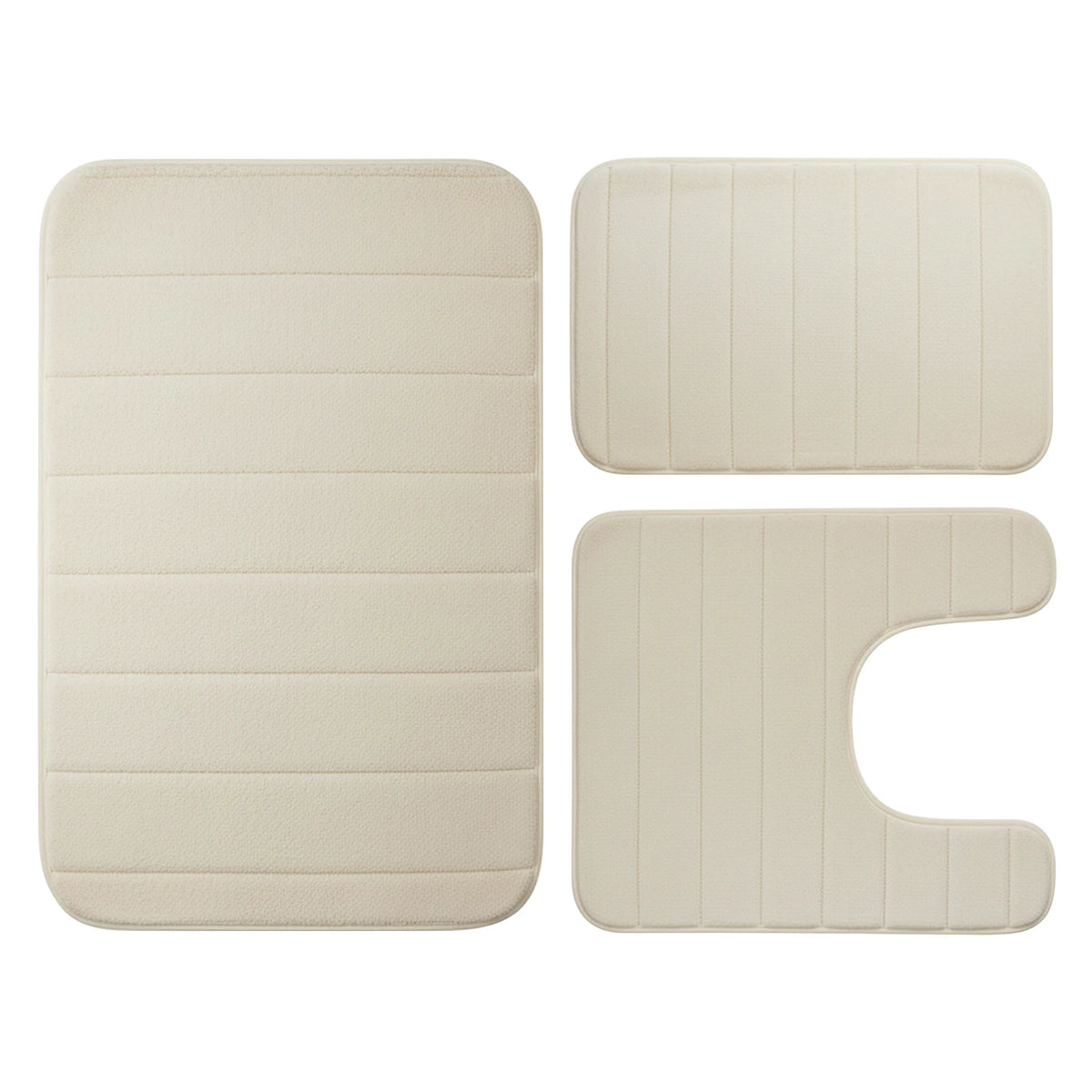 A set of three beige plush memory foam bath mats with non-slip backing.