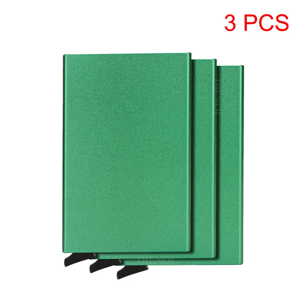 Three green slim RFID-blocking metal wallets stacked together.