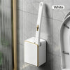 A white wall-mounted disposable toilet brush set with a replaceable head is shown against a gray tiled wall.