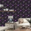 A modern interior wall featuring a dark purple geometric pattern with bright magenta lines and decorative shelves.