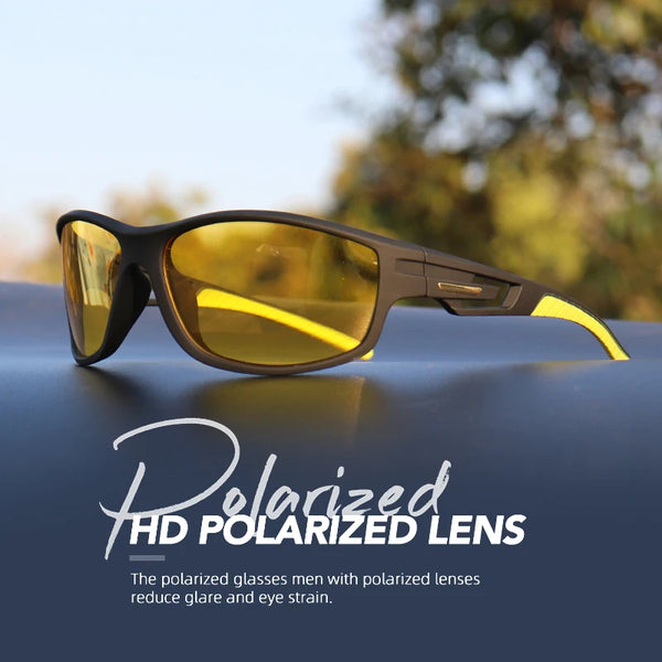 A pair of brown polarized sunglasses resting on a dark surface.