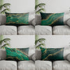 A set of modern geometric decorative pillowcases featuring a dark teal background with flowing gold lines and foliage pattern