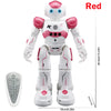 A white interactive gesture-control robot with pink accents and a remote control visible.
