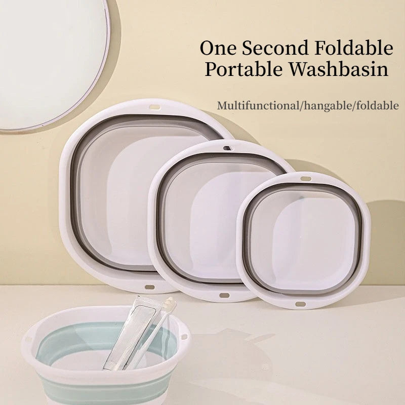 A white foldable portable washbasin shown with multiple units and a small basin in the foreground.