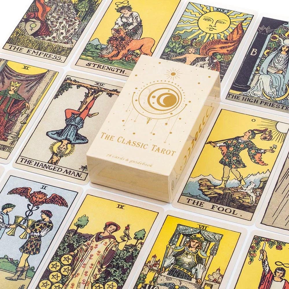 A collection of classic tarot cards and a guidebook displayed in a box.