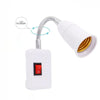White lamp holder extension adapter with a switch and a threaded light socket.