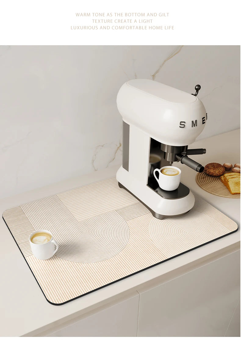 A white electric tea maker sits on a beige counter mat with striped patterns, set against a light background.