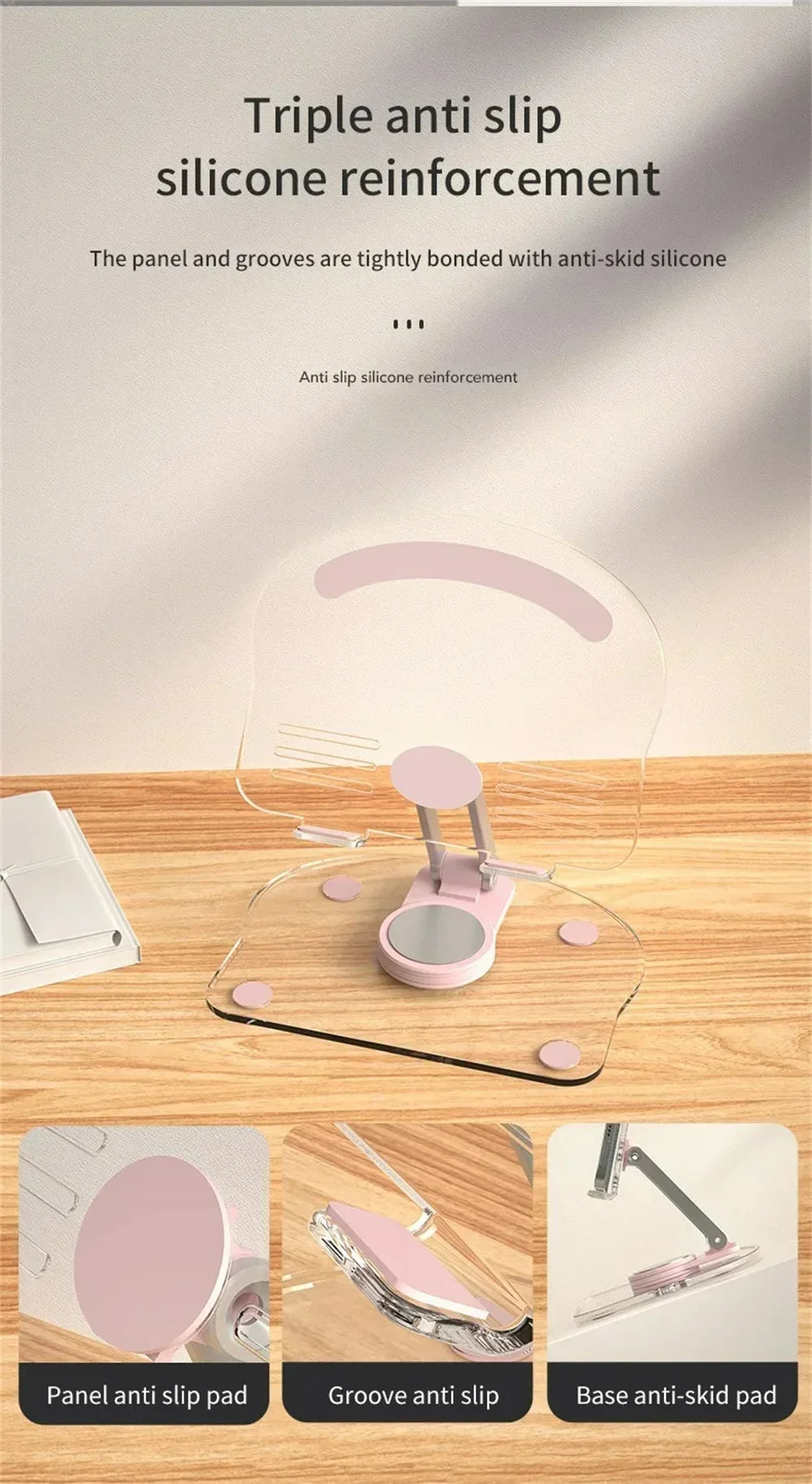 A clear acrylic tablet stand with a pink silicone base and grooves for anti-slip reinforcement.