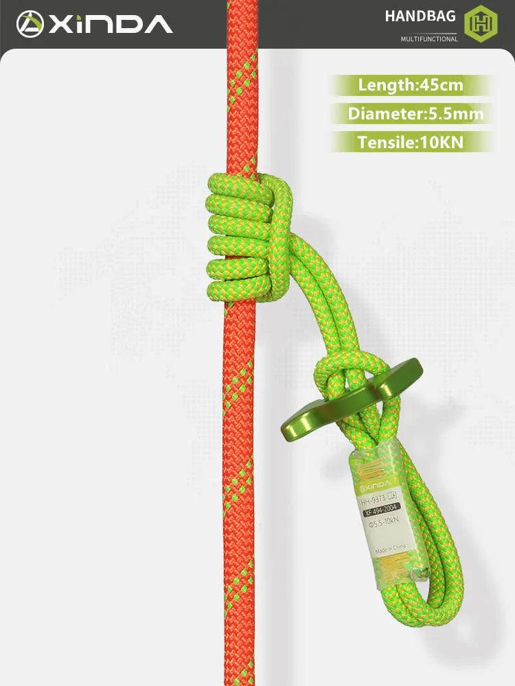 A close-up view of a green auxiliary rope with a yellow knot and a metal clip, shown against a white background.