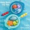 A blue floating bath toy set featuring a turtle and a shark inside a net for baby bathing.