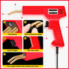 A red plastic welding gun tool with a gold tip and various features shown on the side.