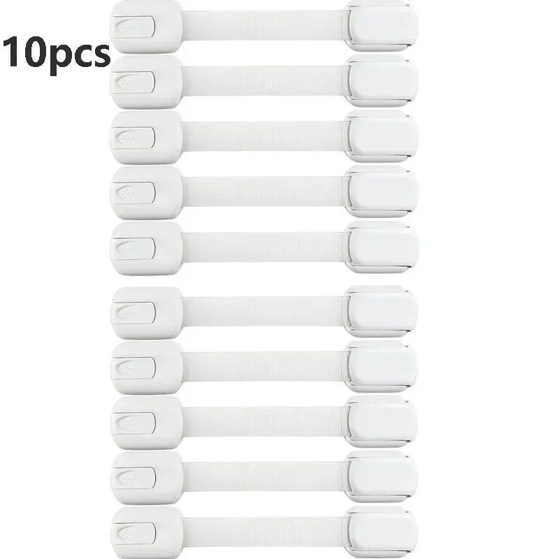 Ten white child safety cabinet locks with flexible straps arranged in a vertical line.