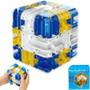 A clear plastic cube puzzle toy with blue and yellow sections, designed as a ball rolling maze challenge.