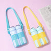 A light blue and yellow breathable mesh crossbody water bottle carrier with two bottles.