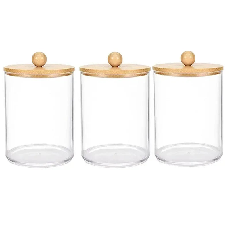 Clear acrylic apothecary jar with a wooden lid