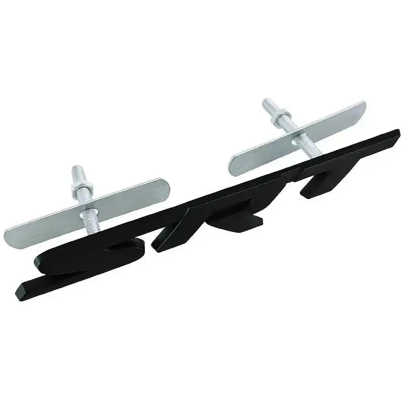 Black metal grille emblem with silver accent and mounting hardware