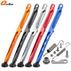 A set of five colored motorcycle side stand kits with ABS feet, including orange, black, silver, red, and blue.