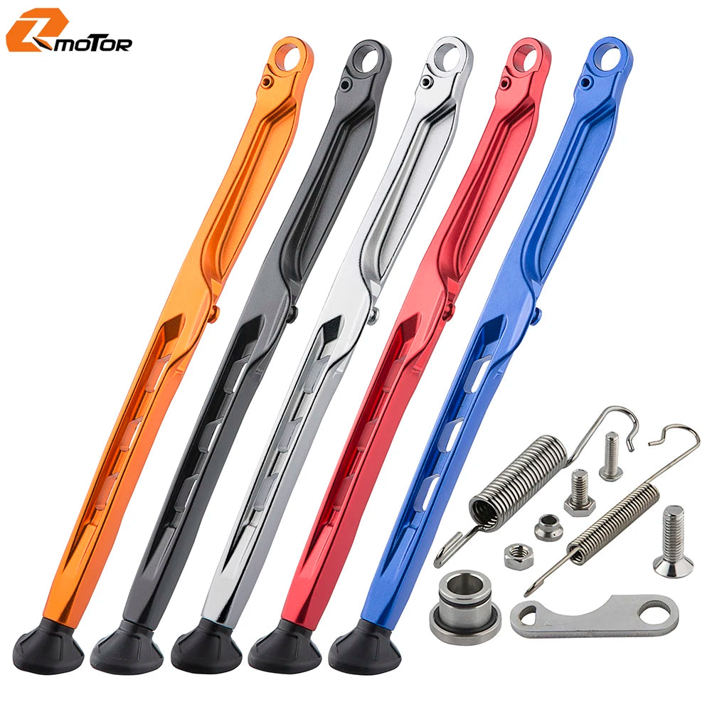 A set of five colored motorcycle side stand kits with ABS feet, including orange, black, silver, red, and blue.
