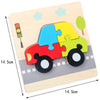 A wooden puzzle set shaped like a yellow vehicle made of interlocking puzzle pieces on a light wooden board.