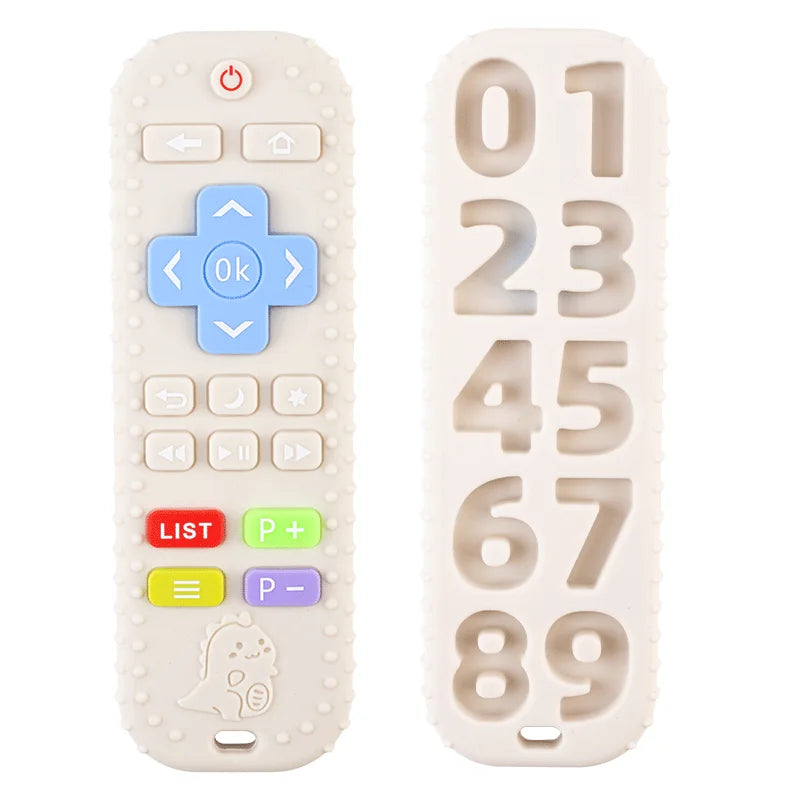 A beige silicone baby teether toy with various buttons and a remote control shape.