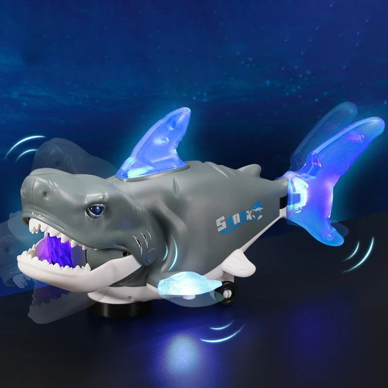 A gray shark toy with glowing blue lights is shown against a dark blue background.