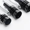 A close-up view of a black exhaust turbine whistle fitting, showing the metal end and the black cylindrical body.