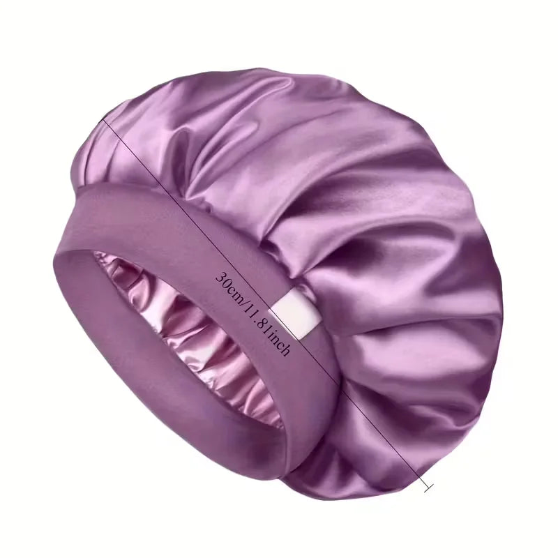 A purple silk satin sleep bonnet with a wide elastic band shown from above.
