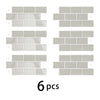 A collection of six rectangular, light beige 3D waterproof peel-and-stick kitchen wall tiles arranged in rows.